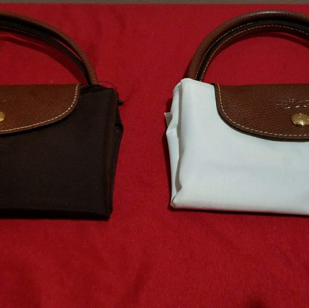 Longchamp small bags..Brown @$120 each picture shows detail.